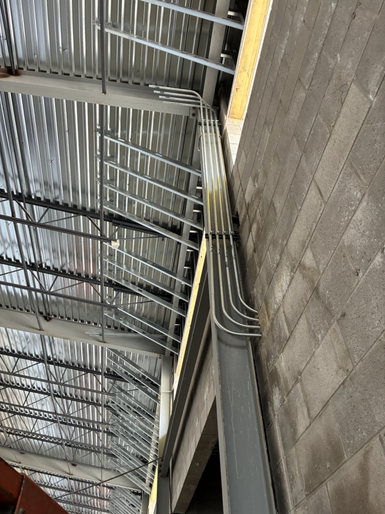 Precision conduit installation with EMT wiring runs by Del Haven Electric