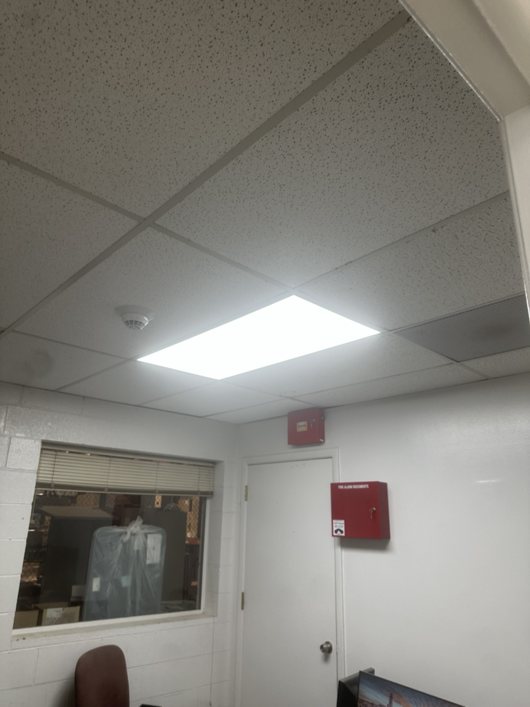 LED panel light installed in commercial drop ceiling by Del Haven Electric in Auburn, WA