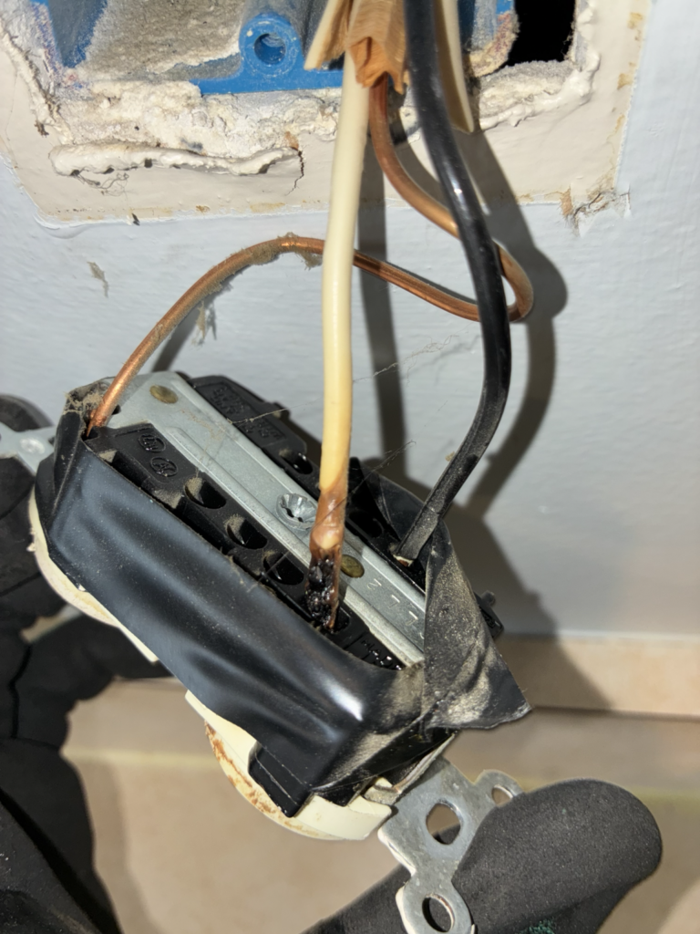 Overheated conductor connection at electrical device