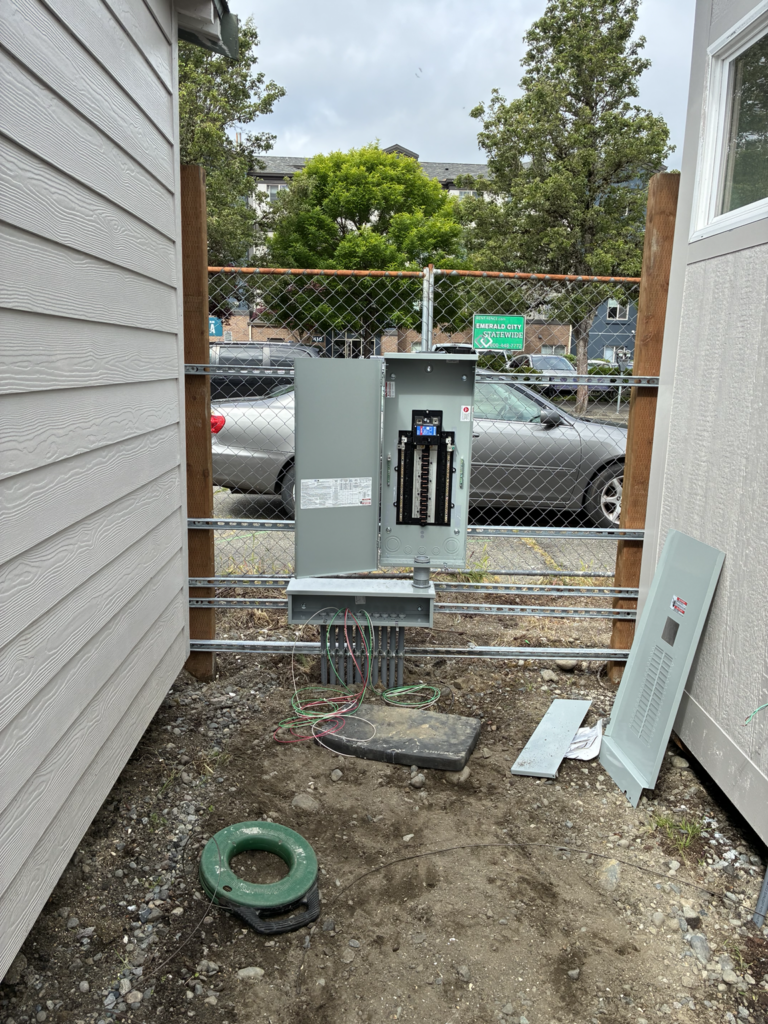 Commercial electrical service equipment and disconnect panel installed outdoors