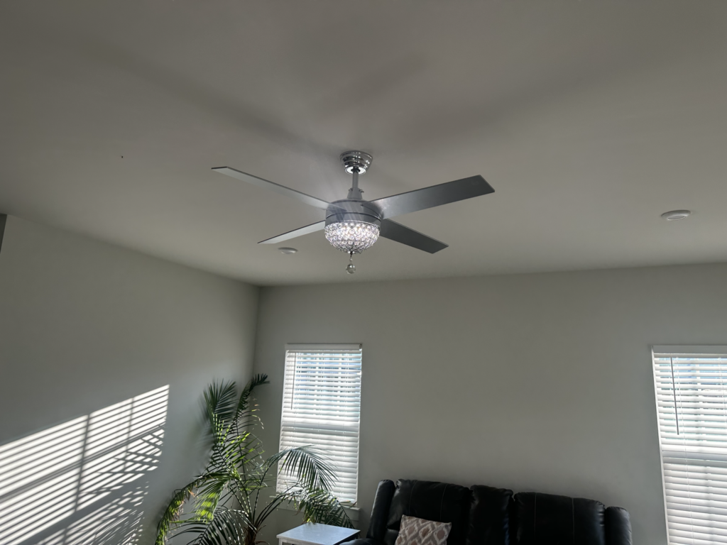 Living room ceiling fan and lighting installed by Auburn WA residential electrician